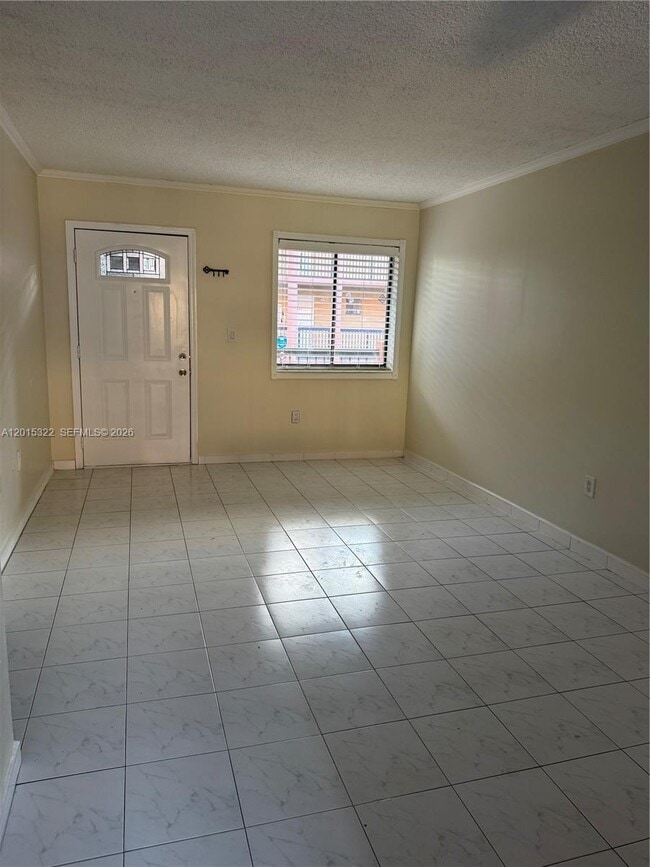 Building Photo - 5490 W 21st Ct