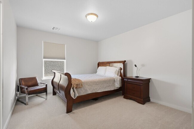 Building Photo - Stunner! This beautiful home features a spacious open floor plan with primary suite and private o...