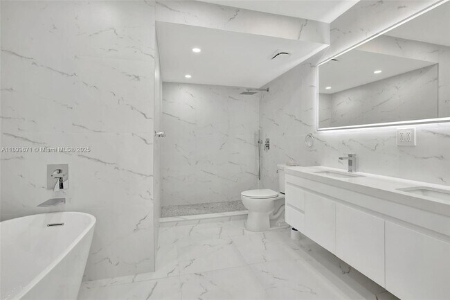 Building Photo - 9801 Collins Ave