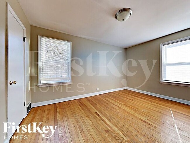 Building Photo - 1573 W 100th Pl