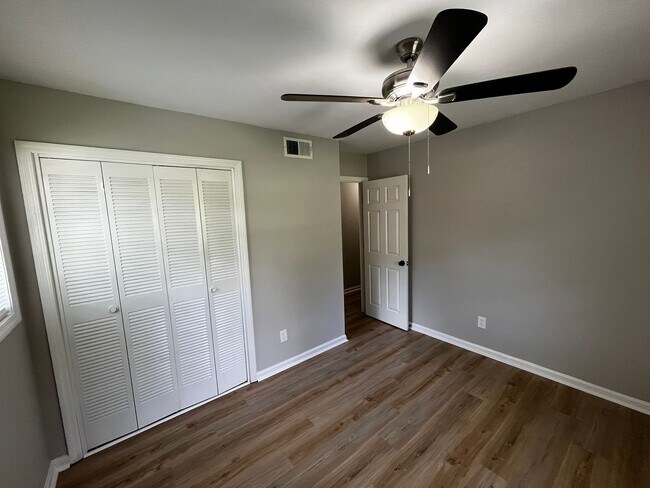 Building Photo - Must See the Sunroom off the Primary Bedroom!