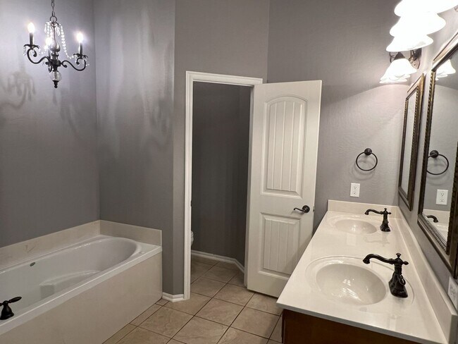 Building Photo - (3) Bed/(2) Bath + Study and Safe Room in ...