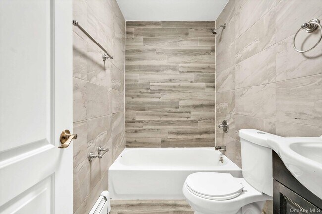 Building Photo - 228-07 146th Ave