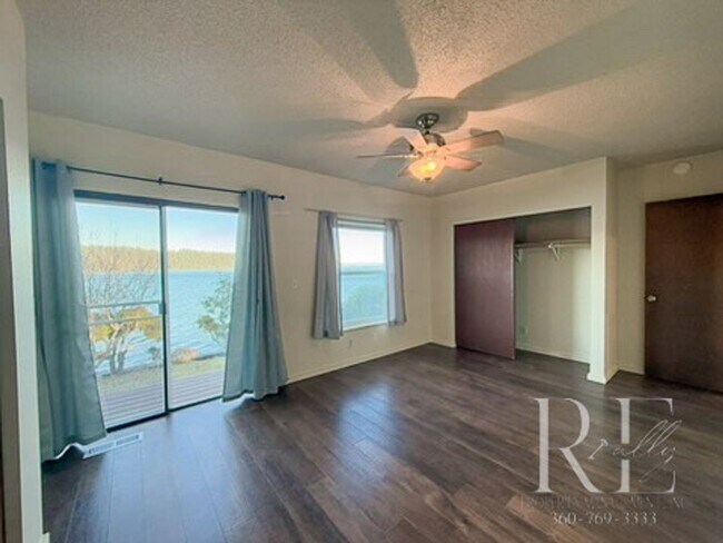 Building Photo - Waterfront Bliss: Stunning Puget Sound Views & Your Own Private Beach!