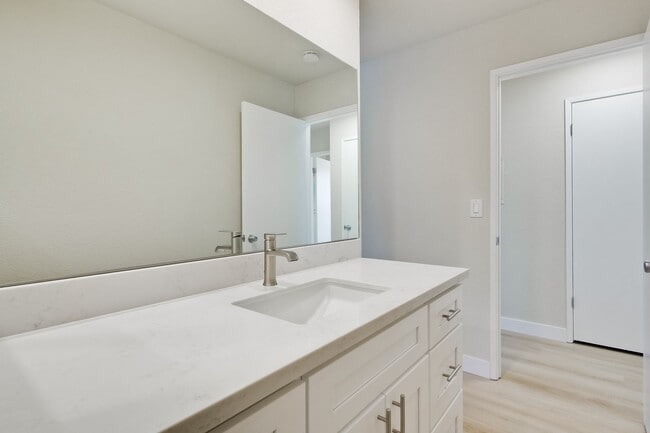 Building Photo - Refreshed 2/2 Second Floor Campbell Condominium in Great Location! Attached Garage & Additional S...