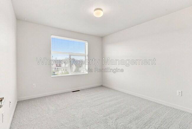 Building Photo - 9004 E 49th Pl