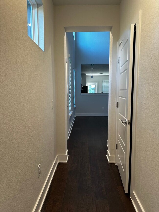 Building Photo - For Lease – Modern 2023 Condo Backing to Greenbelt | Creekside at Pioneer Crossing West