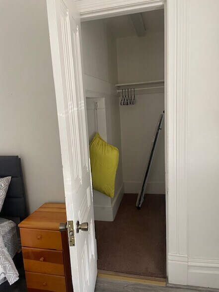 Bedroom Walk in Closet - 701 W Poplar St