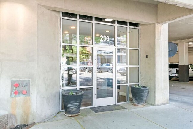 Building Photo - 2BR Condo w/ Covered Parking and Balcony Views at Broadway Towers