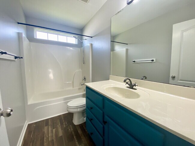 Building Photo - Three Bedroom Home with fenced-in Backyard oasis!