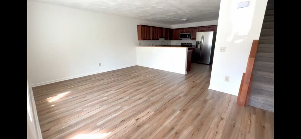 Large living room area off of kitchen - 834 Patrick Henry Dr