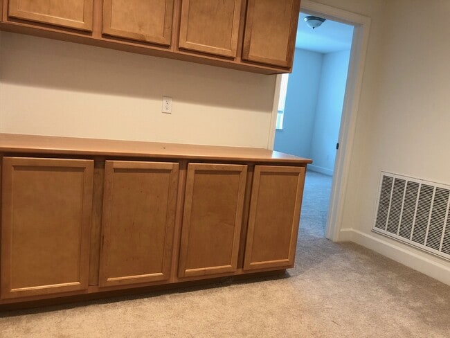 Building Photo - Tri-level Townhome with 2 Car Attached Gar...