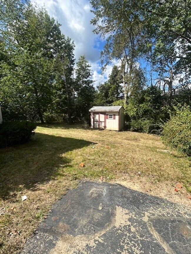 Building Photo - Bright Cape w/ Sunroom, Central Air, Big Basement & Backyard Shed