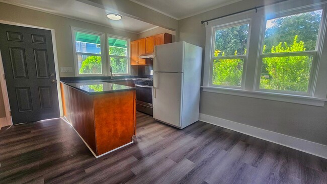 Building Photo - Charming 3-Bedroom Craftsman in Prime Seat...