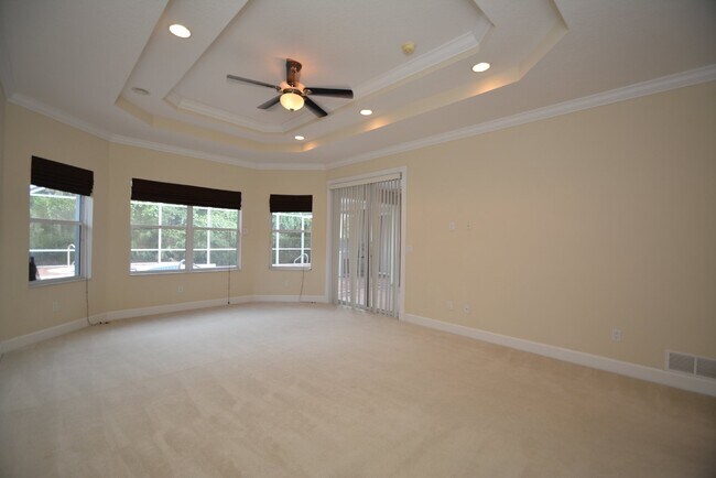 Building Photo - Luxurious Pool Home in gated community of ...
