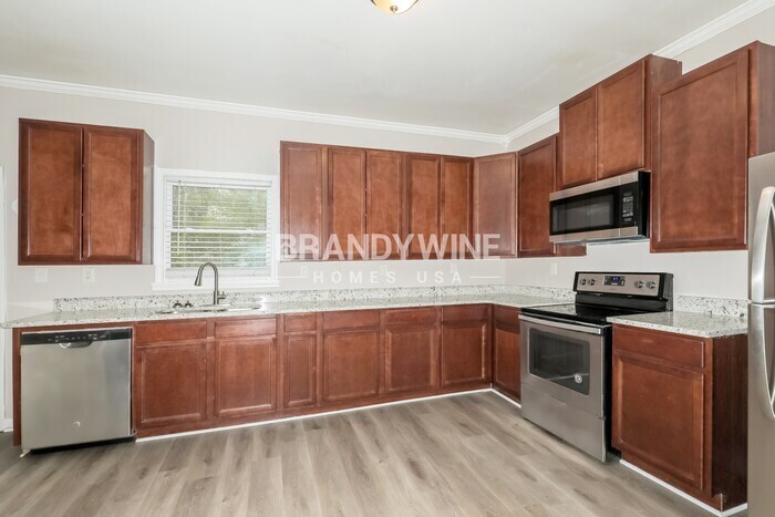 Building Photo - 6945 Merrywood Dr