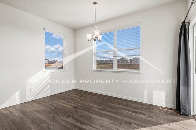 Building Photo - Modern 4-Bed, 2.5-Bath Home with 2 car garage, AC and Private Enclosed Yard