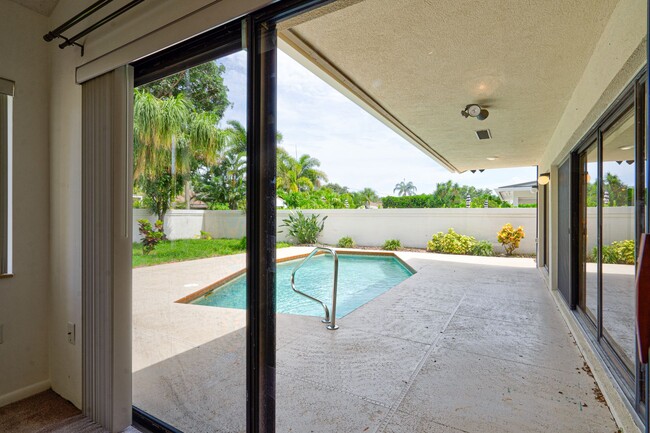 Building Photo - Luxurious 3 Bedroom Oasis with Pool and Beach Access AVAILABLE NOW!