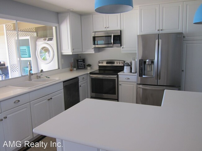 Building Photo - 4 br, 3 bath House - 217 Koko Isle Circle