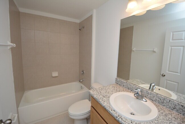 Building Photo - "Charming 3-Bedroom Duplex with Granite El...