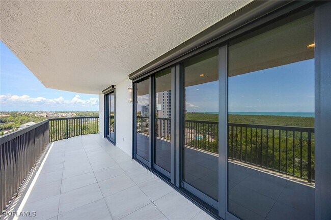 Building Photo - 6075 Pelican Bay Blvd