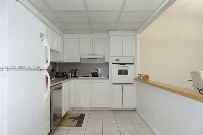 Building Photo - 19380 Collins Ave