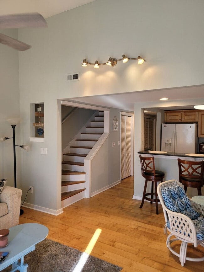 Building Photo - Located in Caneel Cove this 2 bed 2 bath townhome features hardwood floors throughout ,