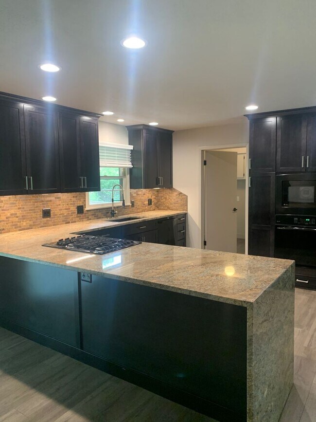 Building Photo - Brentwood South Subdivision - Completely Remodeled 3 Bedroom 2 Bath Home With Huge Backyard!