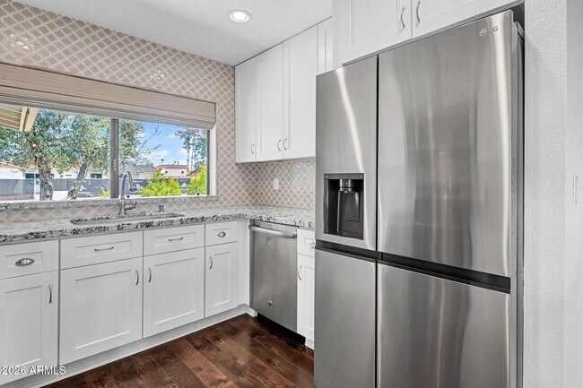 Building Photo - 5219 E Winchcomb Dr