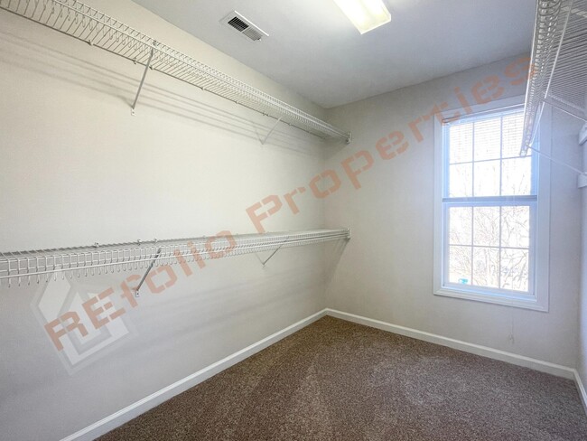 Building Photo - Freshly Painted 4-Bedroom Home with New Ca...