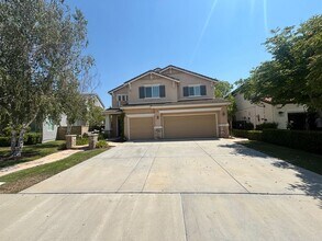 Building Photo - Spacious 4-Bedroom Home with Community Ame...