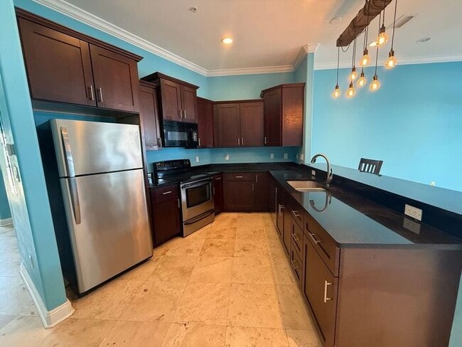 Building Photo - Navarre - Hidden Bay Village - 3 bedroom, 3 bathroom - Waterfront Townhome