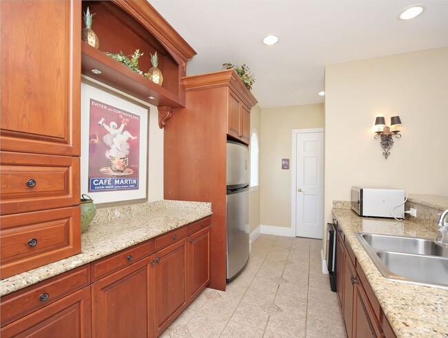 Building Photo - IMMACULATE 2nd Story condominium with so m...