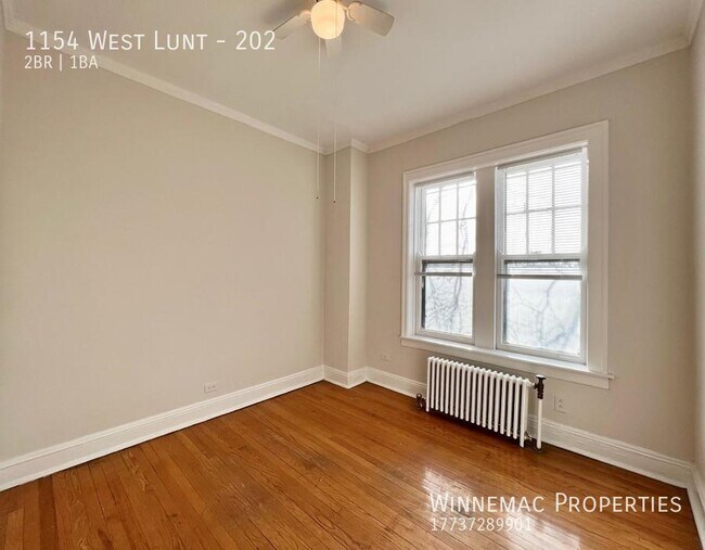 Building Photo - 1154 West Lunt-202