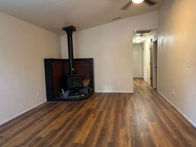 Building Photo - Charming Redding Home with Fireplace & Vau...