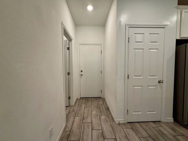Building Photo - GATED 3 BED 2.5 BATH TOWNHOME WITH 2-CAR GARAGE, COVERED PATIO & COMMUNITY POOL