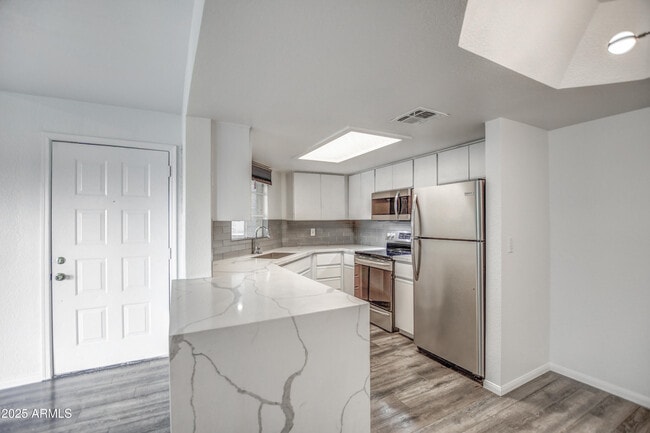 Building Photo - 4850 E Desert Cove Ave