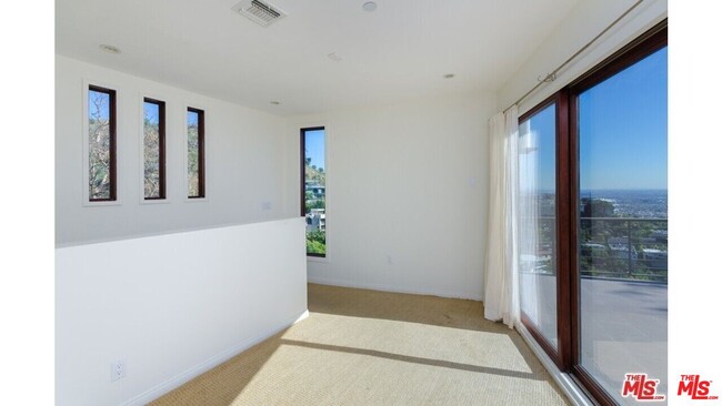 Building Photo - 1874 Sunset Plaza Dr