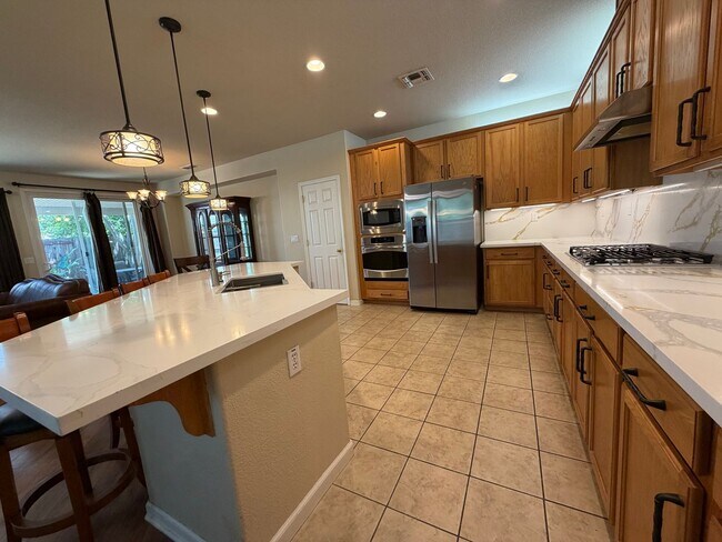 Building Photo - Spacious 4-Bedroom Elk Grove Home with Updated Kitchen, Quartz Countertops! VIEW TODAY!