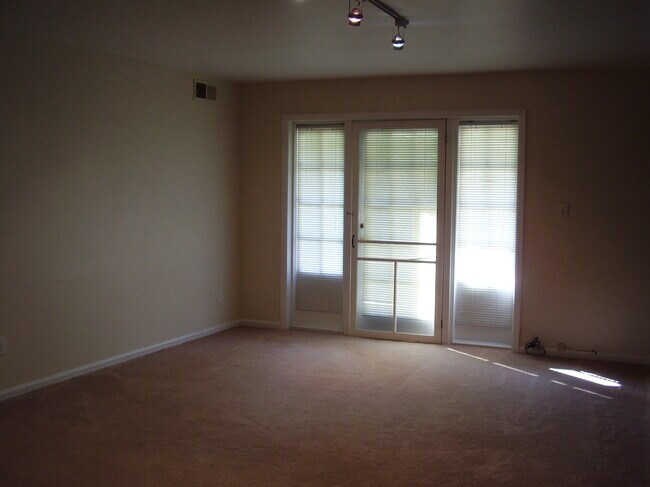 Living Room/door to Patio - 1120 Chatham Park Dr