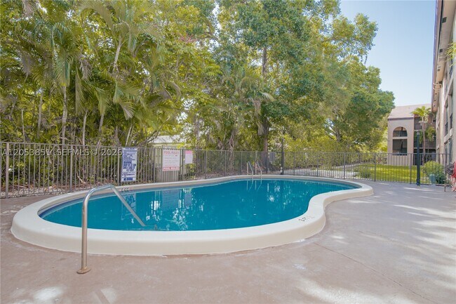Building Photo - 2700 Coral Springs Dr