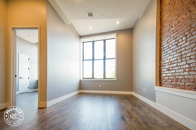 Building Photo - 60-15 Myrtle Ave