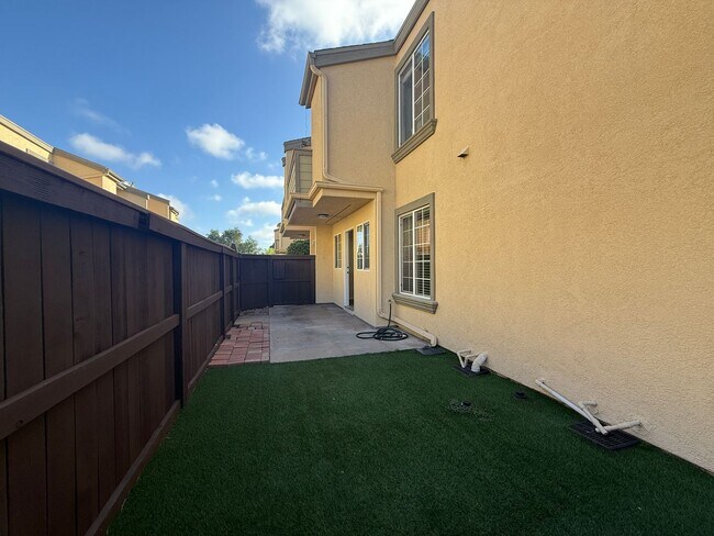 Building Photo - Upgraded Condo with Private Patio, AC, Pool, Gym, and Covered Parking in Gated Community
