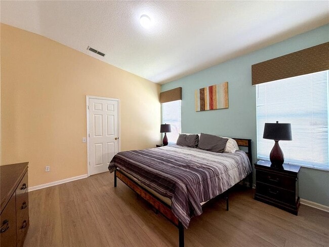 Building Photo - 8127 Fan Palm Way