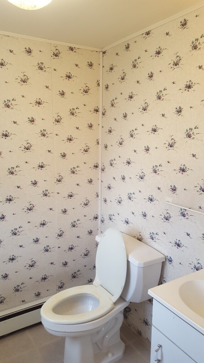First floor half bath (before renovation) - 59 Park Ave