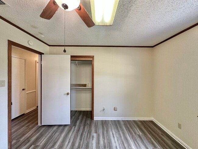 Building Photo - Spacious 4-Bedroom Home on a Corner Lot wi...