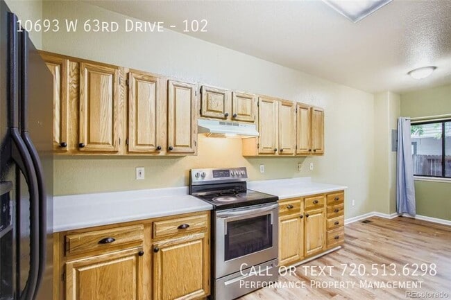 Building Photo - 10693 W 63rd Dr