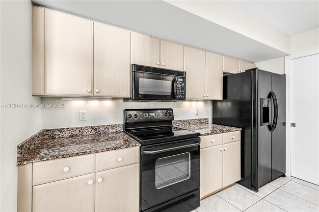 Building Photo - 6917 Collins Ave