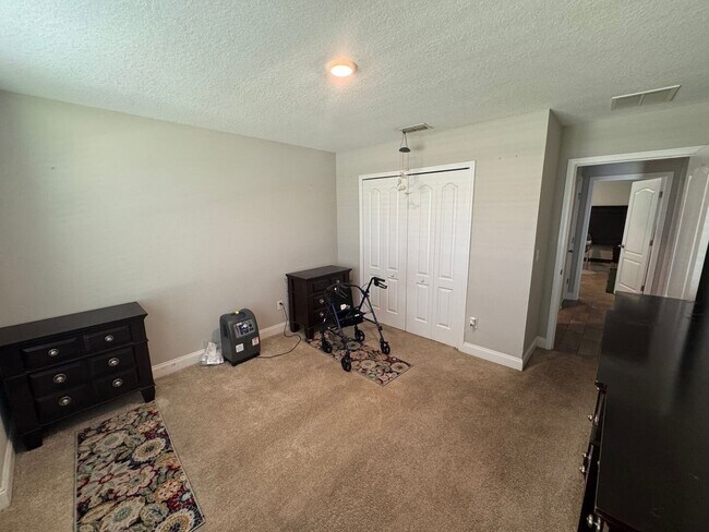 Building Photo - Spacious 4BR/3BA Home in Sawmill Branch at Palm Coast Park! Pool, Tennis & Fitness Center! Pet Fr...