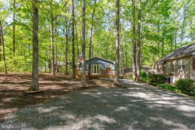 Building Photo - 303 Wilderness Dr
